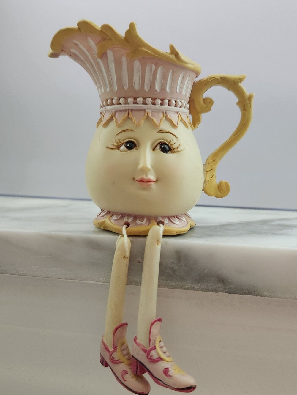 Vintage-style anthropomorphic cream pitcher shelf sitter figurine